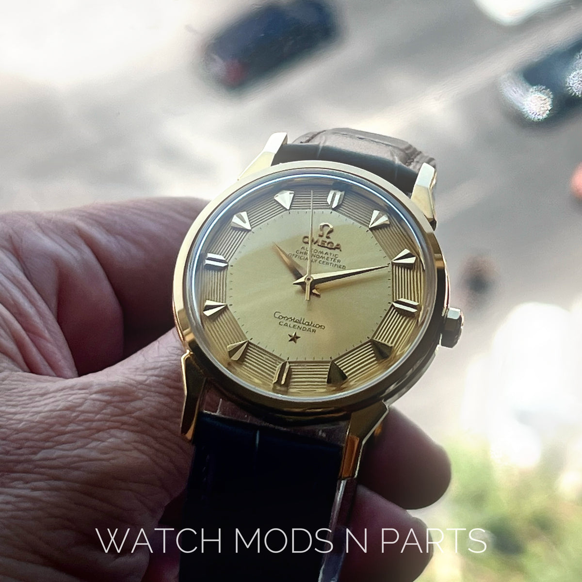 An Omega Constellation Pie Pan Gold dial