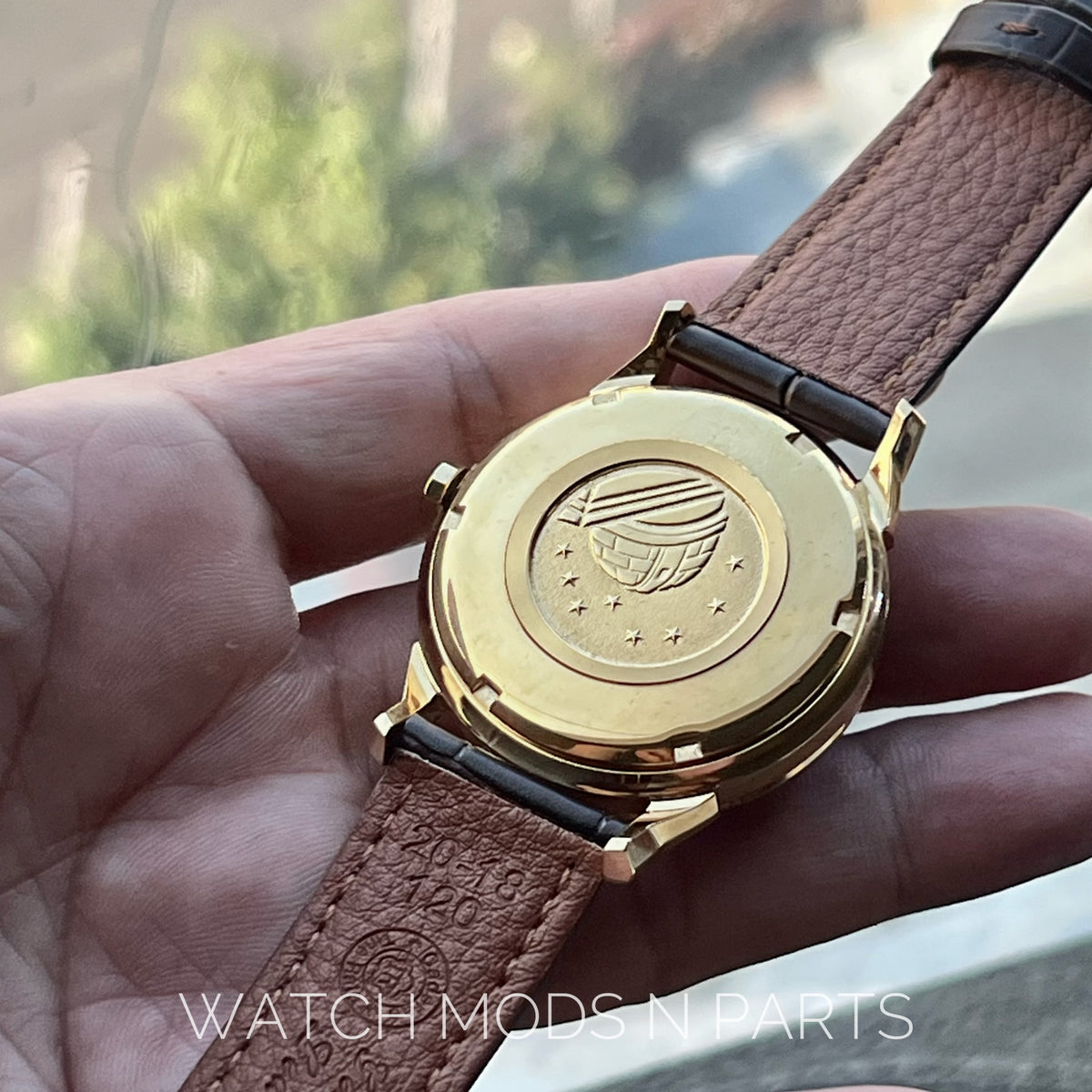 An Omega Constellation Pie Pan Cross Hair Gold Dial